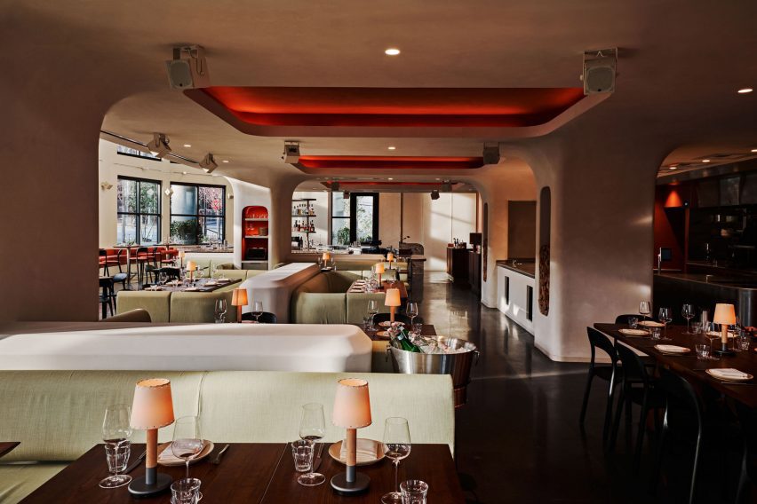 Restaurant interior defined by sculptural plaster forms