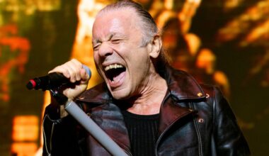 Bruce Dickinson performing onstage with Iron Maiden in 2025