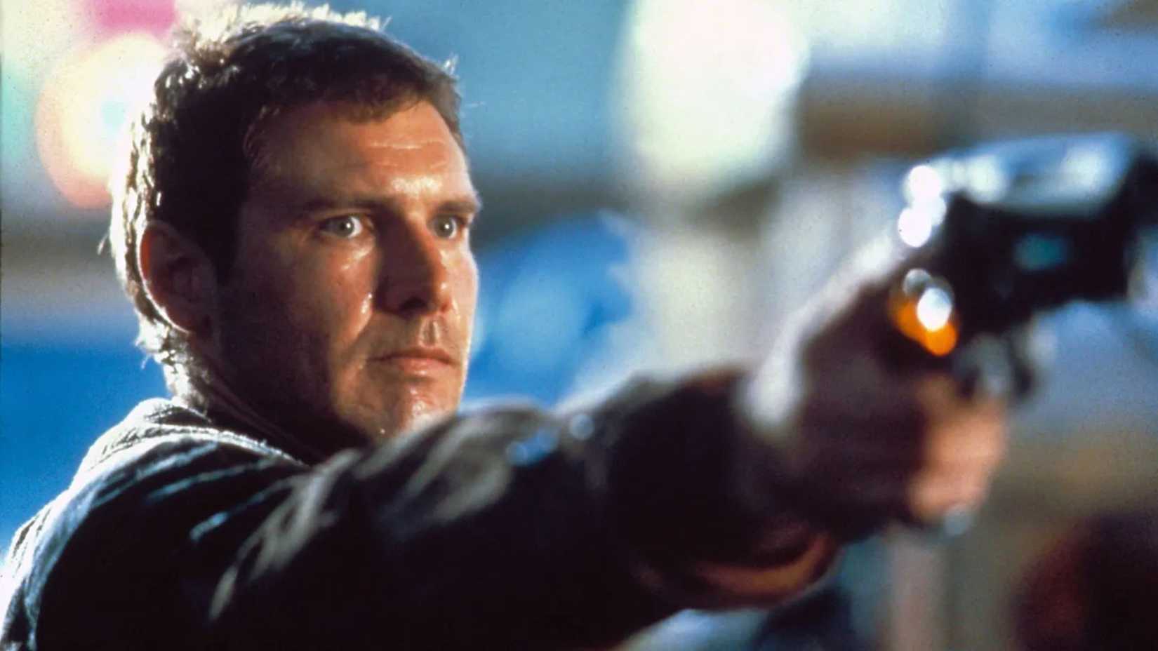 Harrison Ford as Rick Deckard with a gun in Blade Runner