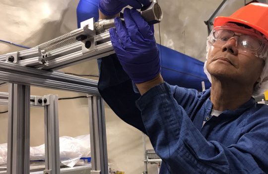 Hogan Nguyen works on the SuperCDMS experiment at SNOLAB. Credit: SuperCDMS collaboration