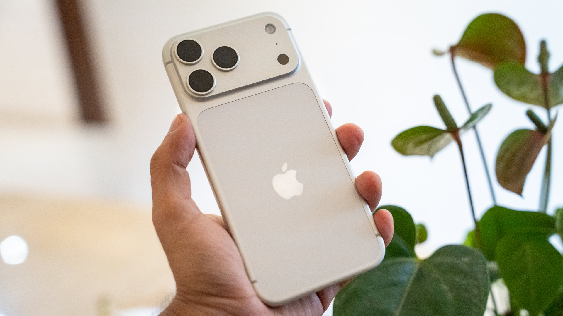 iPhone 17 Pro in hand iPhone 17 Pro in hand
