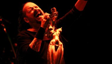 Watch KoRn play new song 'Reward The Scars' live for the first time to 50,000 people at Sick New World