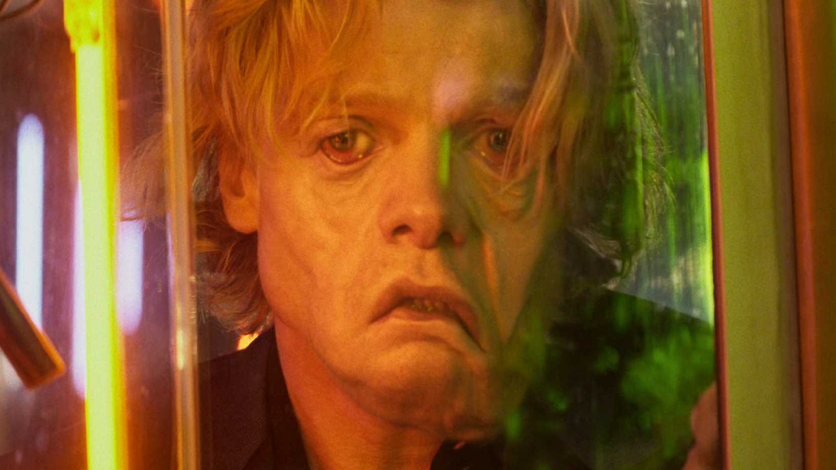 Matt Hagen's (Tom Rhys Harries) face drooping in Clayface