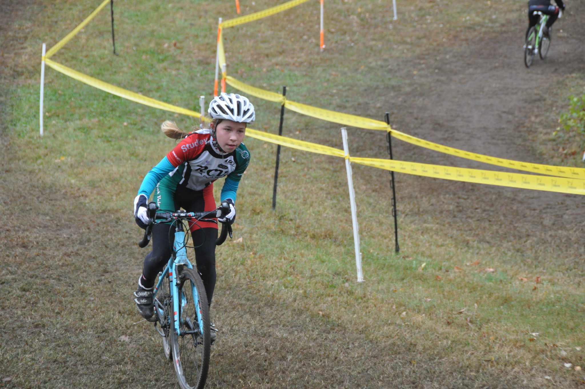 Katia racing cyclocross on a grass circuit as a young child in Maryland