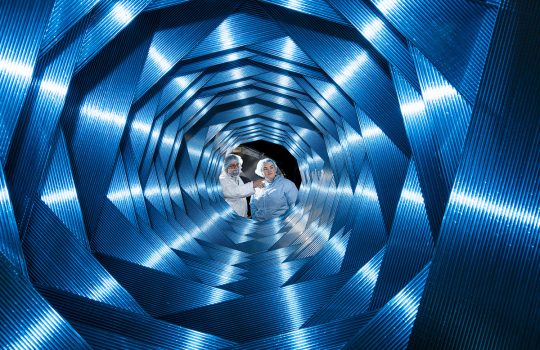 The Mu2e tracker uses straw tubes filled with gas to detect the momentum of an electron. Eighteen panels, each with 96 straw tubes, are aligned to create an almost circular opening for unwanted particles to pass through. Credit: Ryan Postel, Fermilab