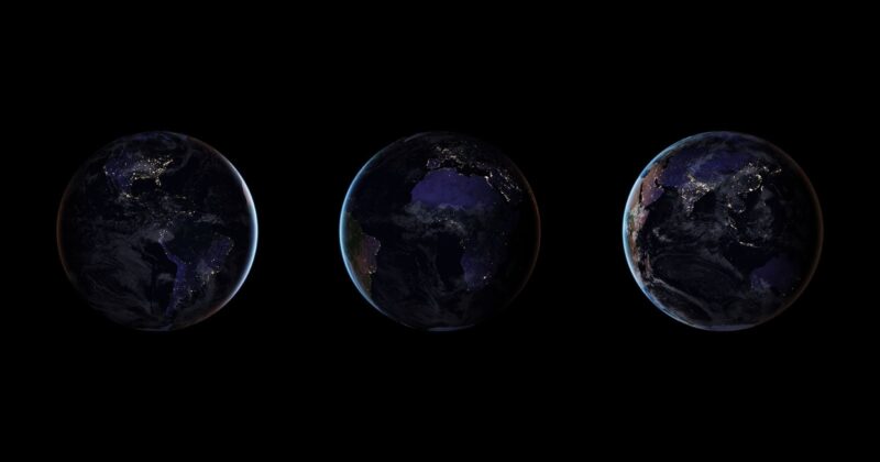 Three views of Earth from space at night, showing illuminated city lights across the continents against a dark background, with North and South America, Africa, and Eurasia visible from left to right.
