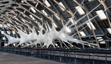 inside numen / for use's strange spaces sculpted from tape and tensioned nets