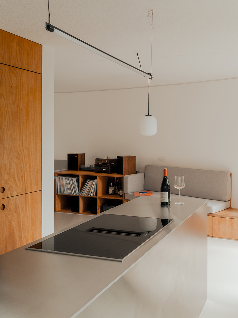 former sewage tank transforms into minimal geometric apartment in amsterdam - 5