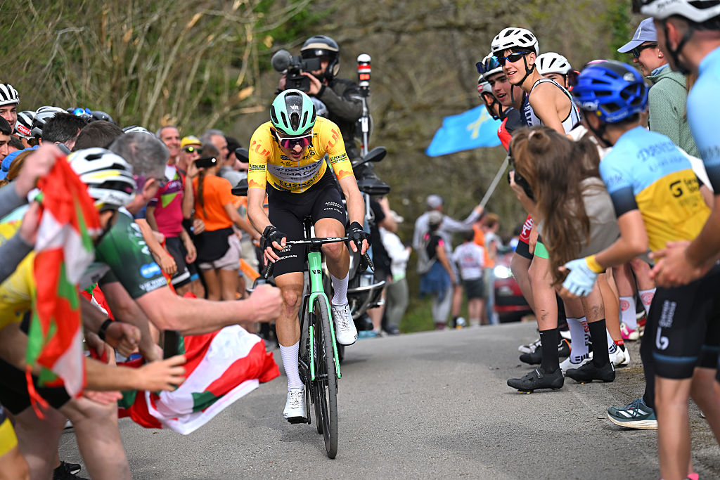 CUEVAS DE MENDUKILO, SPAIN - APRIL 07: Stage winner Paul Seixas of France and Team Decathlon CMA CGM - Yellow Leader Jersey competes in the breakaway while fans cheer during the 65th Itzulia Basque Country 2026, Stage 2 a 164.1km stage from Pamplona-Iruna to Cuevas de Mendukilo 757m / #UCIWT / on April 07, 2026 in Cuevas de Mendukilo, Spain. (Photo by Tim de Waele/Getty Images)