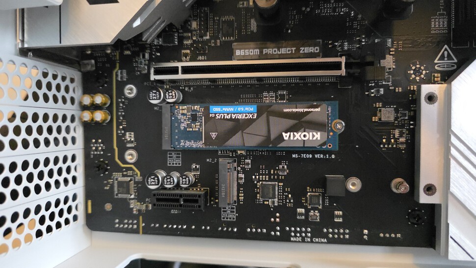 Removing a few screws from the Project Zero branded heatsink reveals two SSD slots, one of which we'll fill now with a 2TB Kioxia Exceria Plus G4 drive.