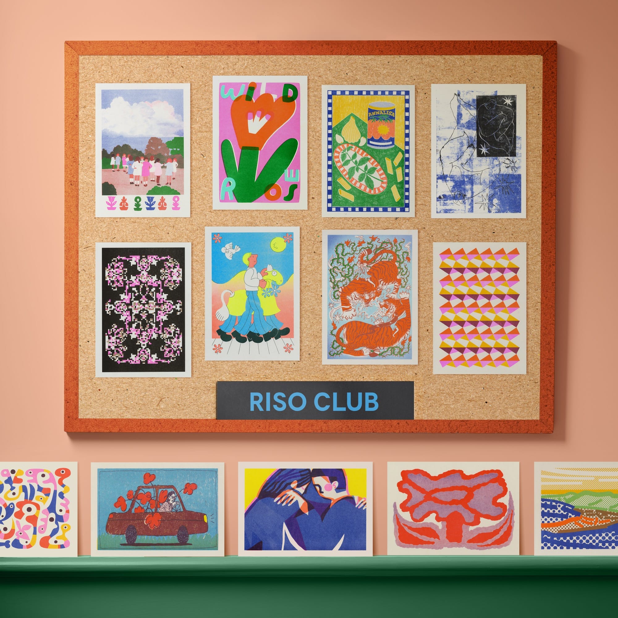 riso prints on a corkboard and shelf