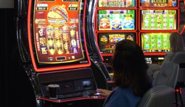 people seated at slot machines