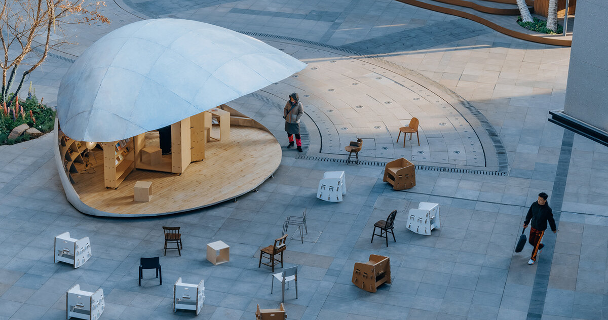 a tiny community library in beijing opens and closes like a clamshell