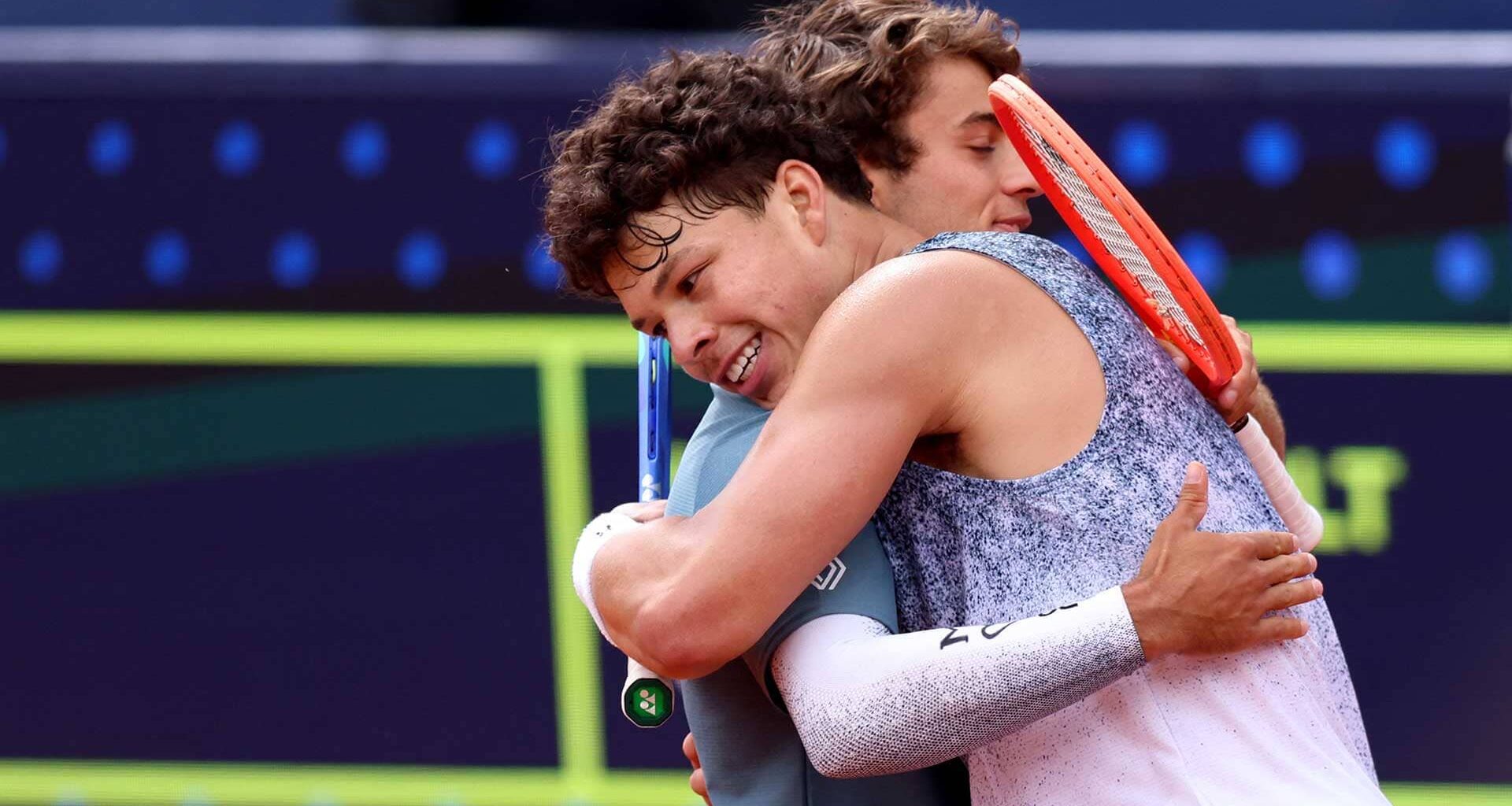 Ben Shelton and Flavio Cobolli embrace following the Munich final on Sunday.
