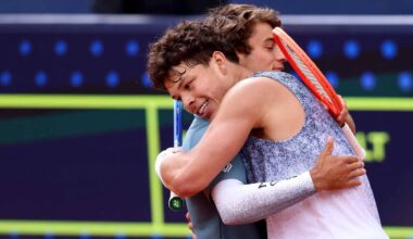 Ben Shelton and Flavio Cobolli embrace following the Munich final on Sunday.