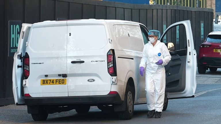 Forensics officers at the scene on Ruby Street in Peckham