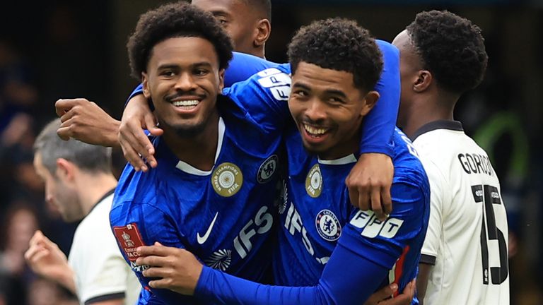Jorrel Hato celebrates with team-mate Wesley Fofana after giving Chelsea an early lead against Port Vale