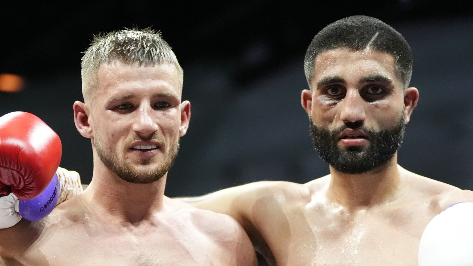 Rhys Edwards (left) and Gully Powar after their vacant British featherweight title bout resulted in a draw at the Utilita Arena Cardiff