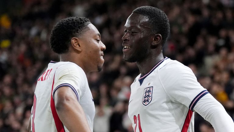 England's Romain Esse (right) celebrates after scoring his sides fourth goal during the 2027 Under 21 Championship Qualifiers match at Carro