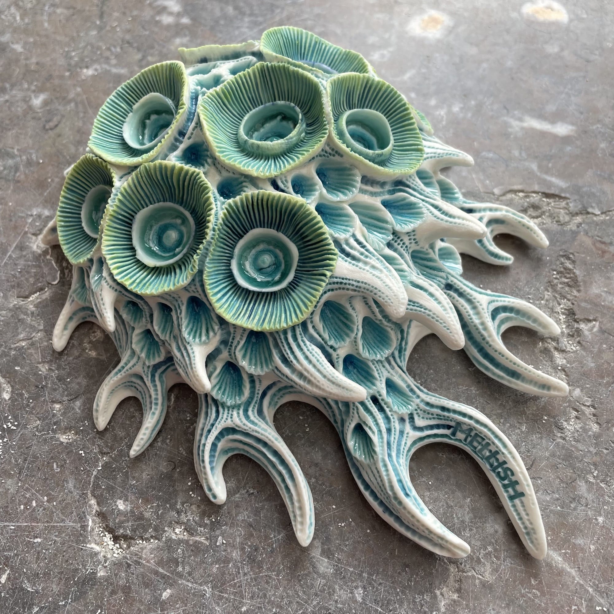 a coral-inspired, colorful ceramic sculpture by Lisa Stevens