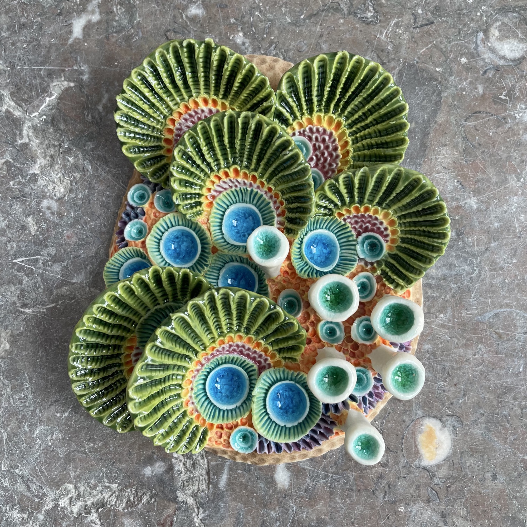 a coral-inspired, colorful ceramic sculpture by Lisa Stevens