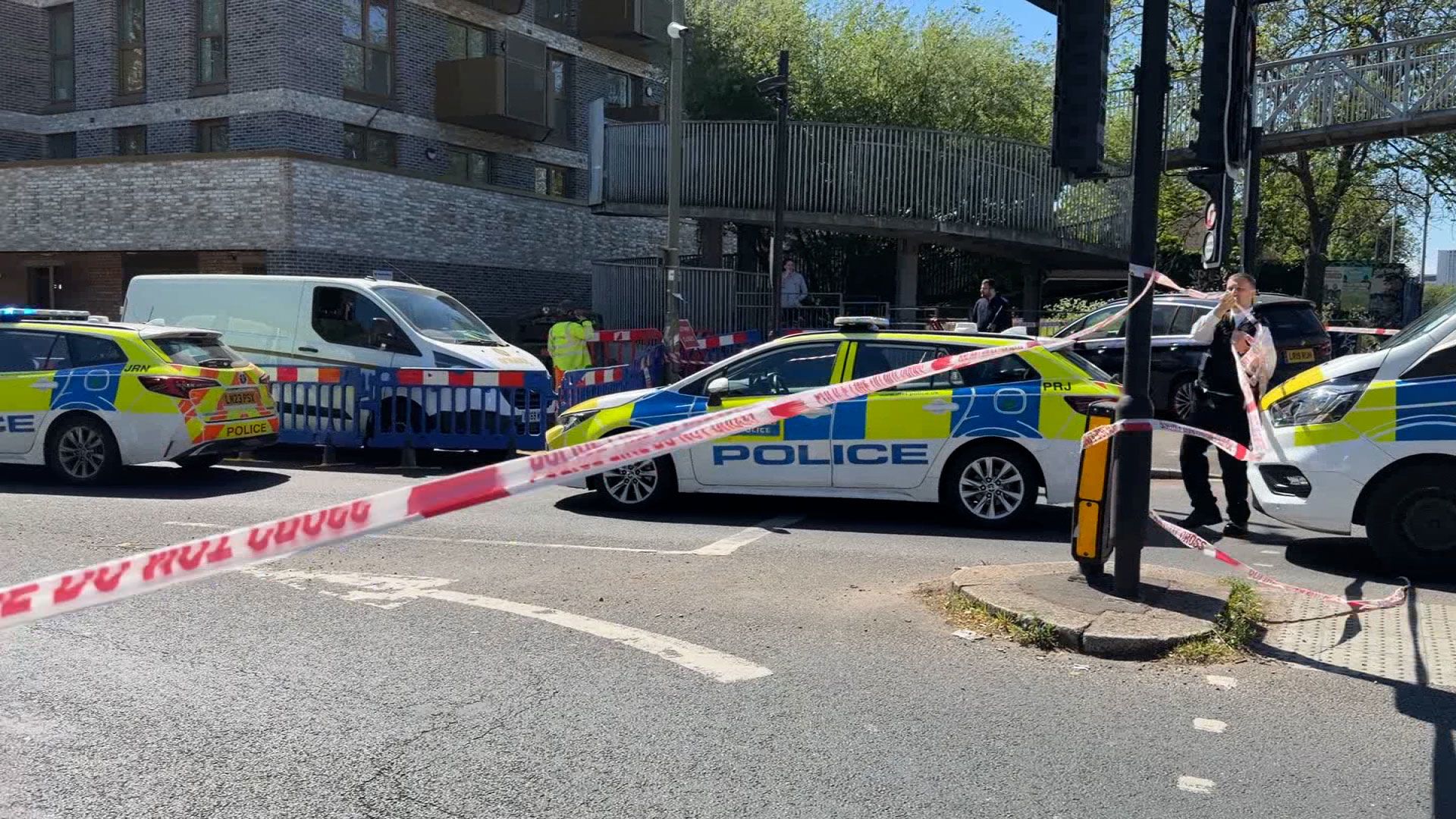 Police put up crime scene tape near the scene of a stabbing in London on Wednesday, April 29, 2026.