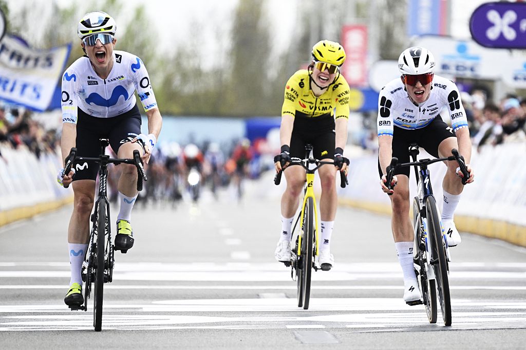 Reusser (L) beginning to celebrate as Nooijen (C) grimaces behind Vollering (R)