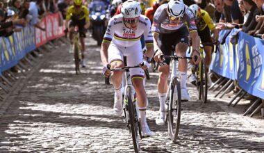 Tadej Pogacar climbs up cobbles