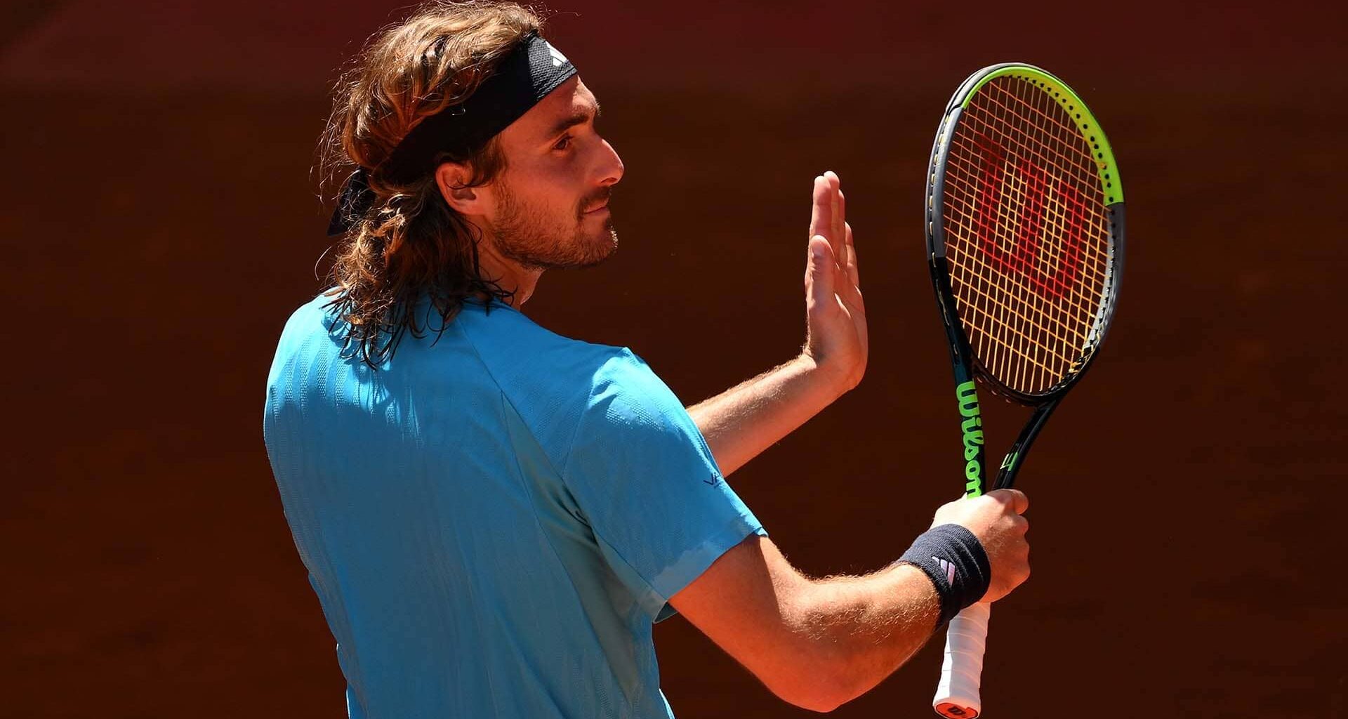Stefanos Tsitsipas celebrates his win against Daniel Merida on Monday at the Mutua Madrid Open.