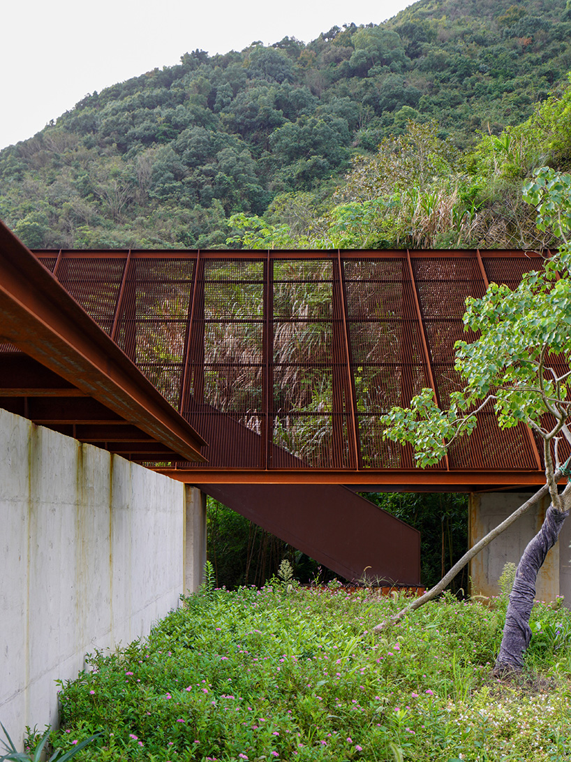 corten-clad twin pavilions frame shifting sea views along chinese coastal valley - 7