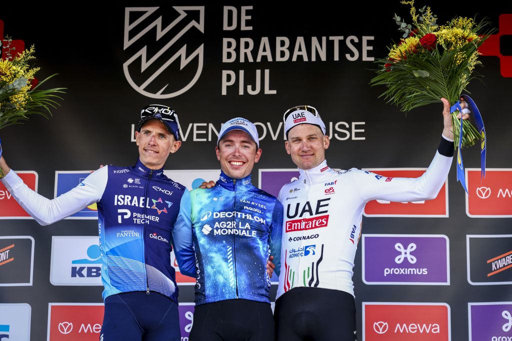 Belgian Dylan Teuns of Israel-Premier Tech, French Benoit Cosnefroy of Decathlon Ag2r La Mondiale Team and Belgian Tim Wellens of UAE Team Emirates pictured on the podium after the men's 'Brabantse Pijl' one day cycling race, 195,2 km from Leuven to Overijse on Wednesday 10 April 2024. BELGA PHOTO DAVID PINTENS (Photo by DAVID PINTENS / BELGA MAG / Belga via AFP)
