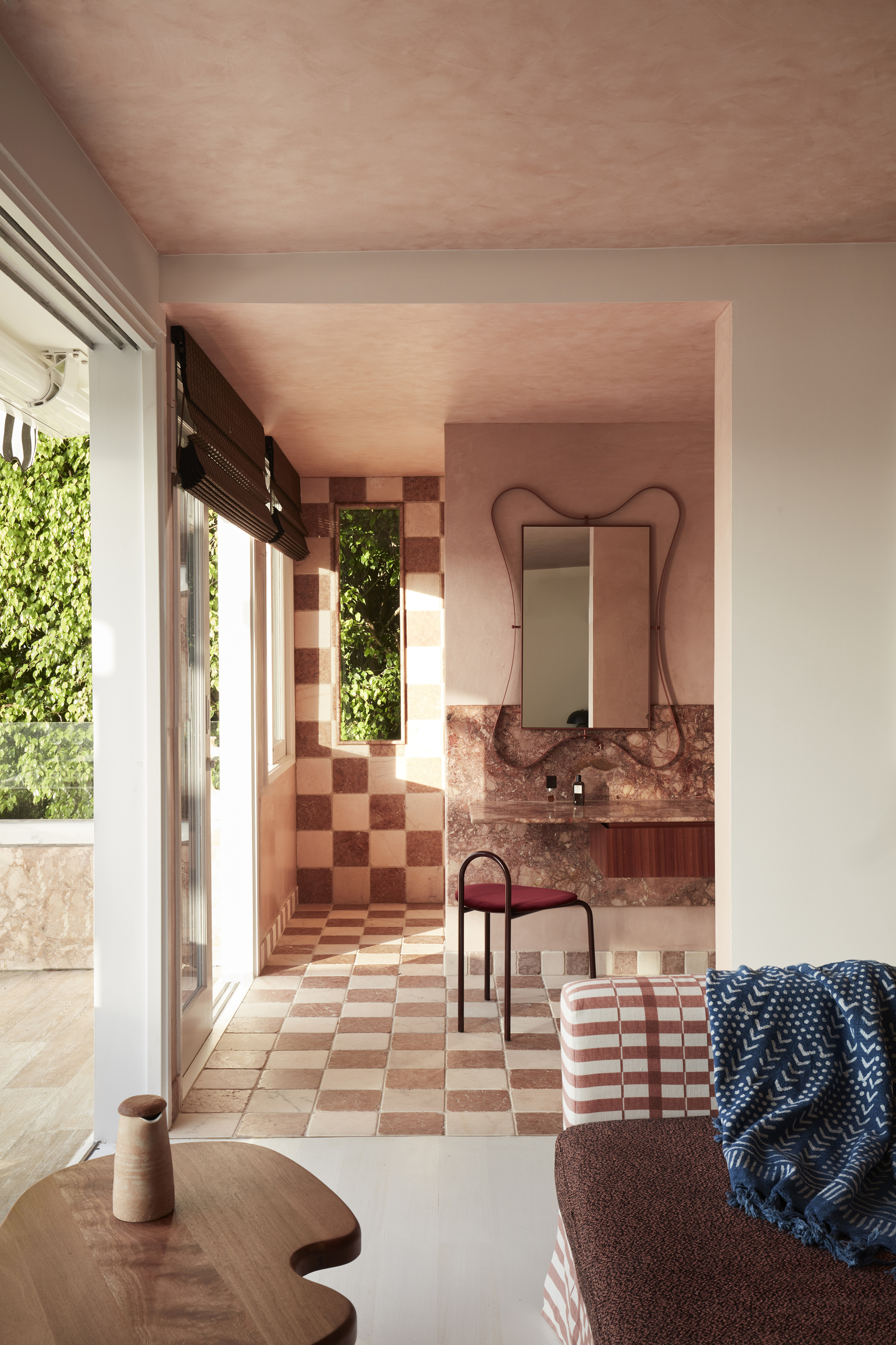 a mediterranean checkered tiled bathroom