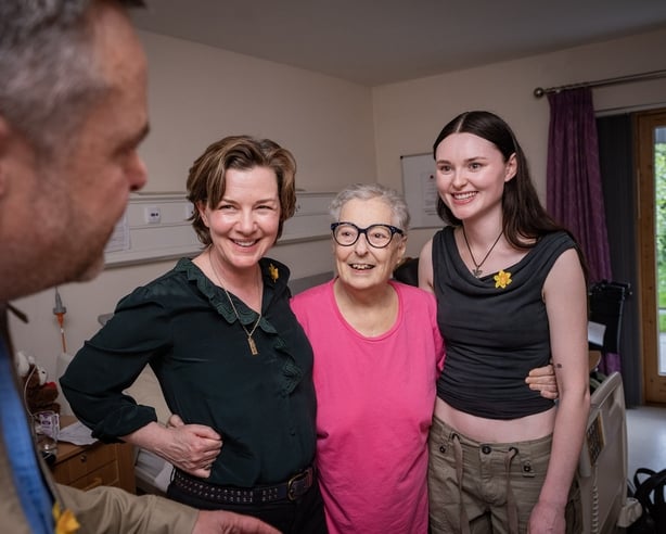 Undated handout photo courtesy of Brian Morrison of actors Joanne Crawford (left) and Katherine Devlin (right), embraced by inpatient Linda Dawson during their visit to the Marie Curie Hospice in Belfast. Stars from the hit BBC police drama Blue Lights visited a Marie Curie Hospice in Belfast after