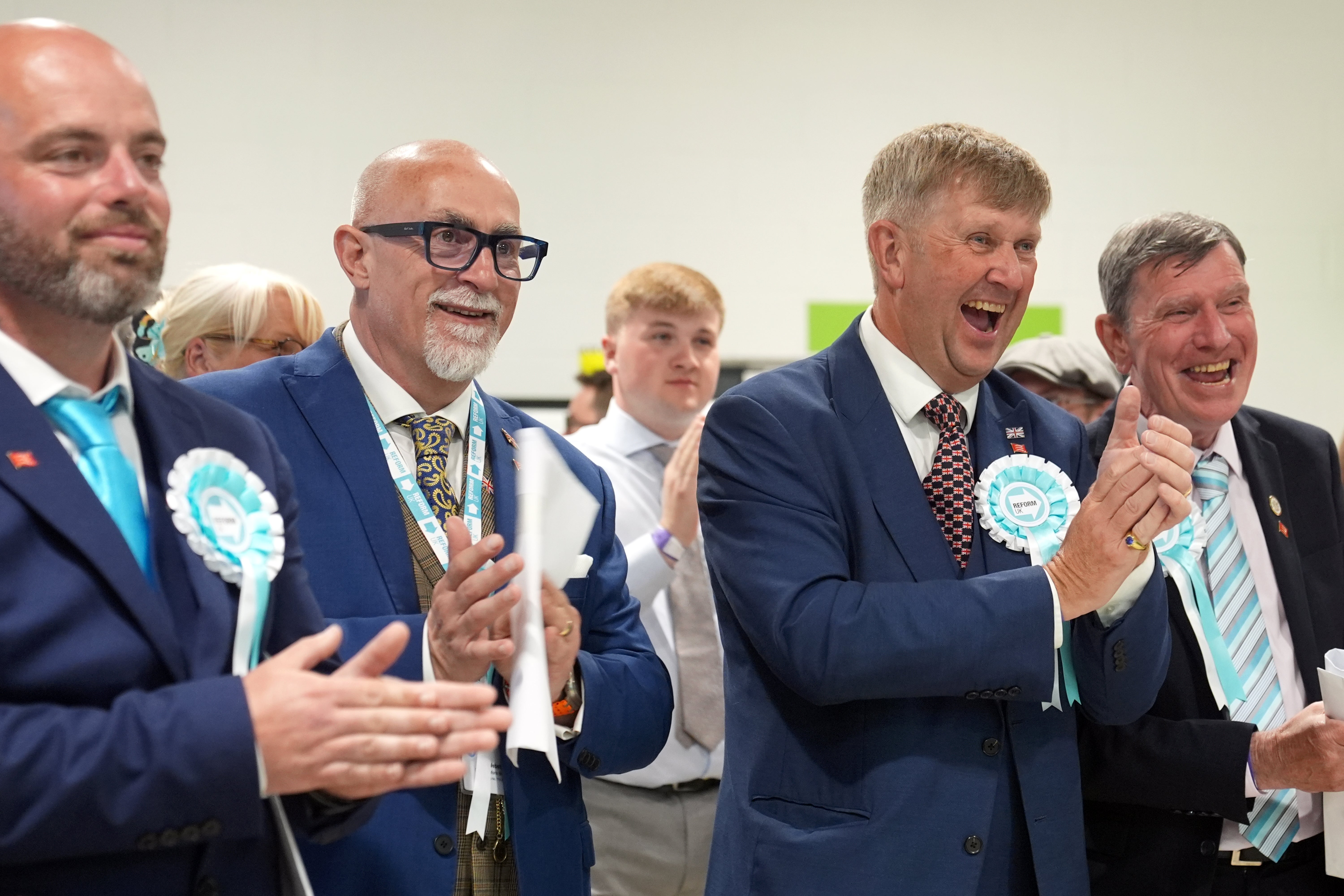 Newly elected Reform councillors celebrate in Essex. The party won 1,454 seats at the recent local elections
