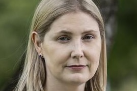 A headshot of a woman with shoulder length blonde hair.