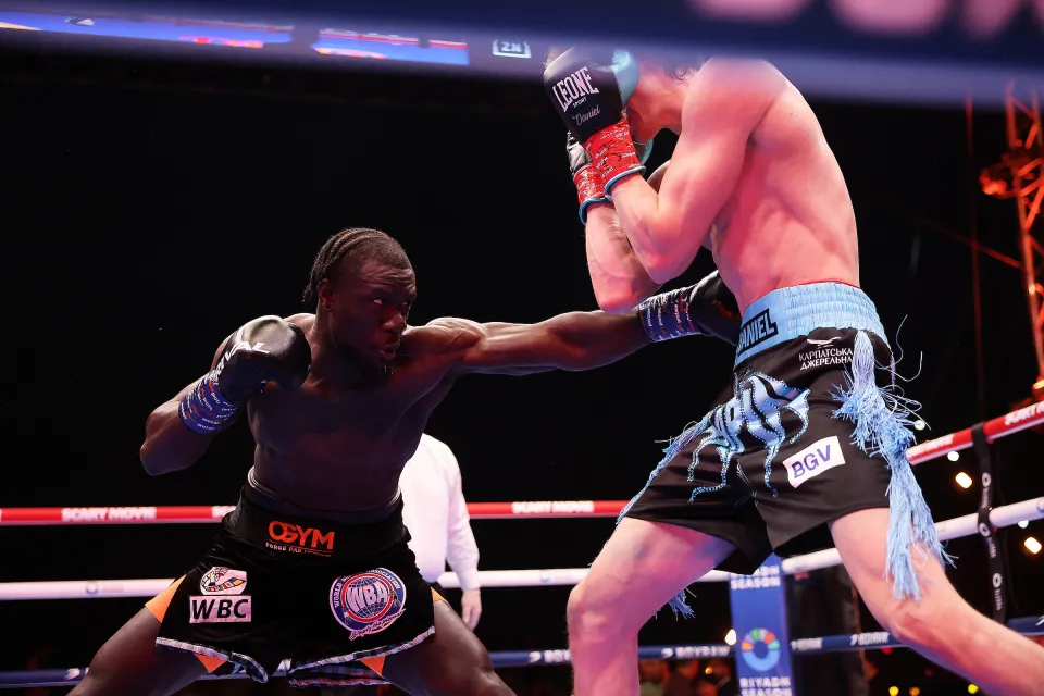Sergey Lapin being punched by Benjamin Tani
