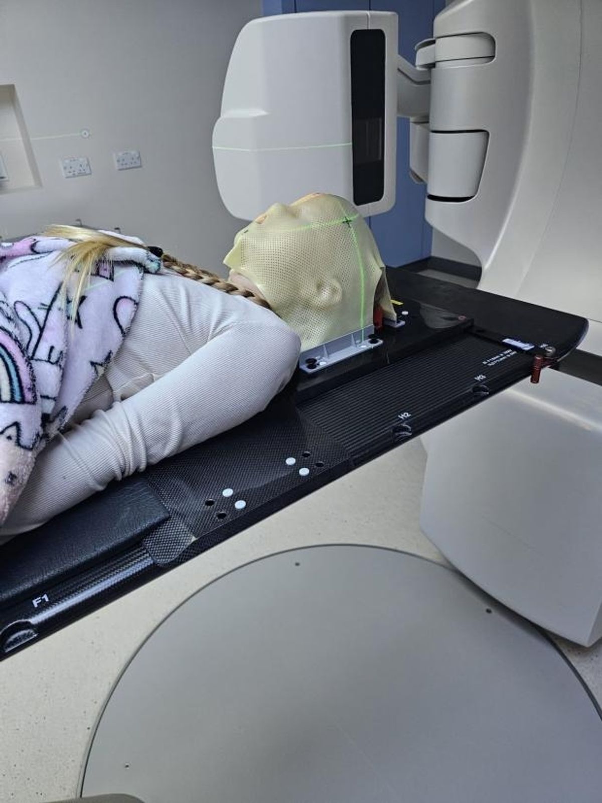 Brave Seren undergoing one of the grueling radiotherapy treatments