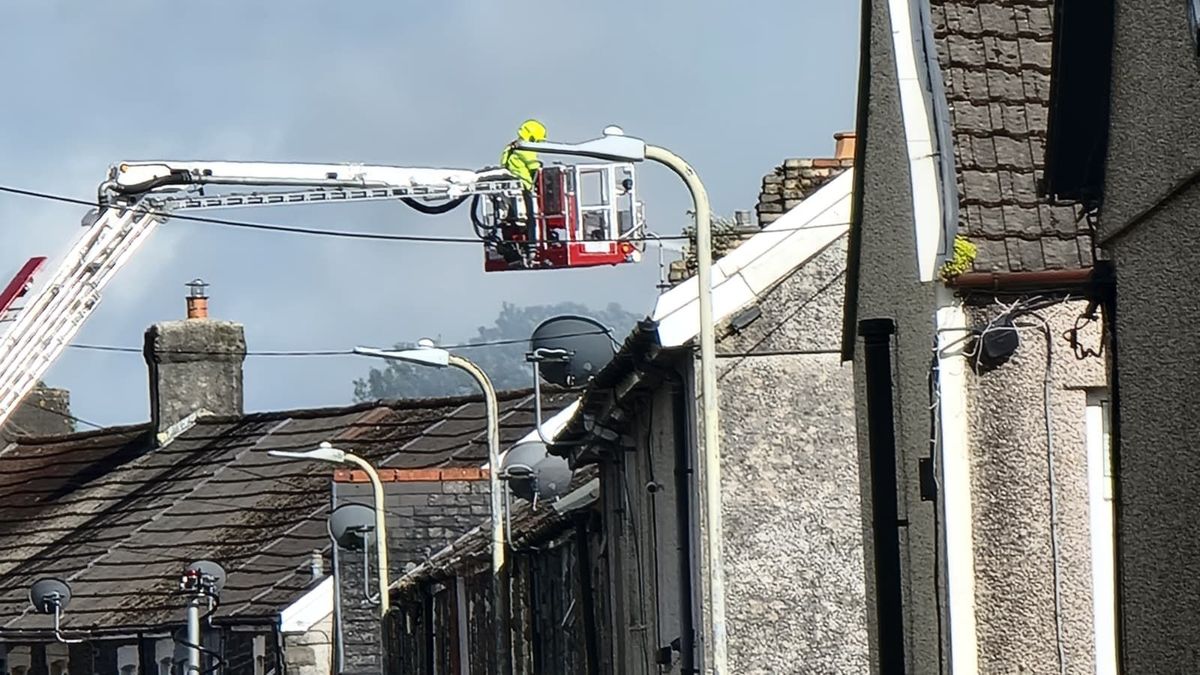 Large plumes of smoke could be seen coming from behind a St John Ambulance hall and video footage shows the sky blackened and thick with smoke