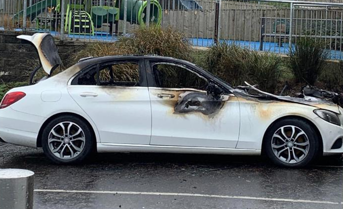 A burnt out car in Killynure Green in 2025