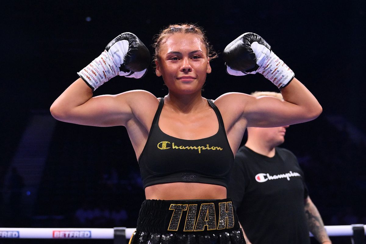 Tiah Mai Ayton poses for a photo following victory in the Women's Super Bantam weight fight between Tiah Mai Ayton and Sara Orszagi at BP Pulse Live
