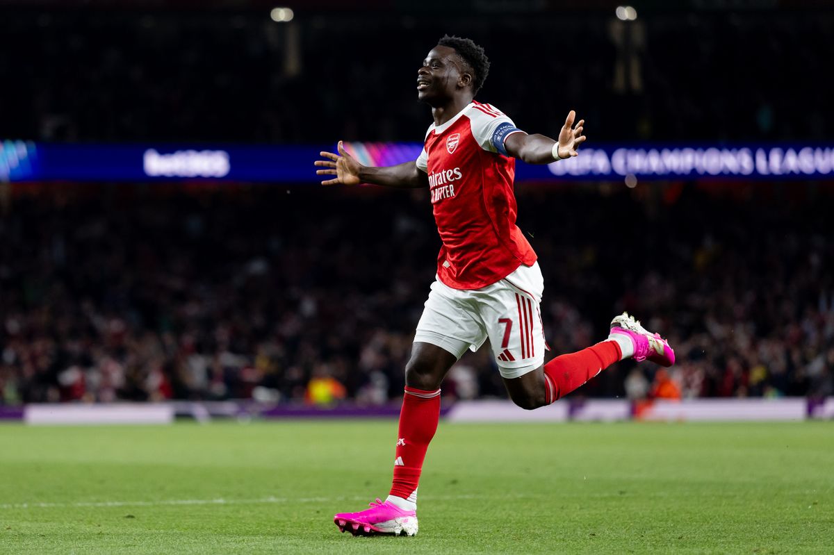 Bukayo Saka of Arsenal celebrates after scoring against Atletico at the Emirates