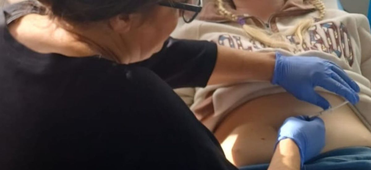 Louise Jensen receives the peptide vaccine treatment.