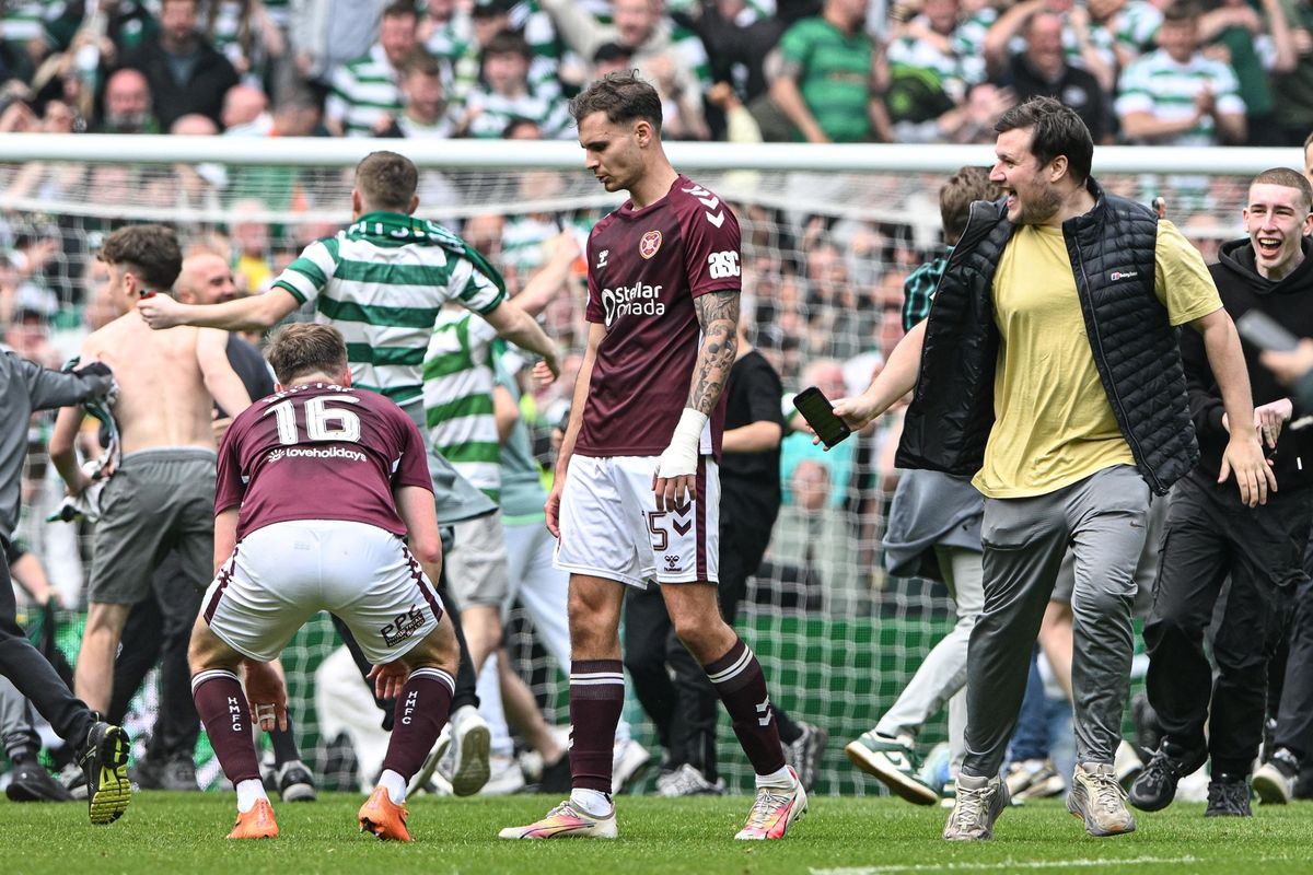 Celtic fans invade the pitch
