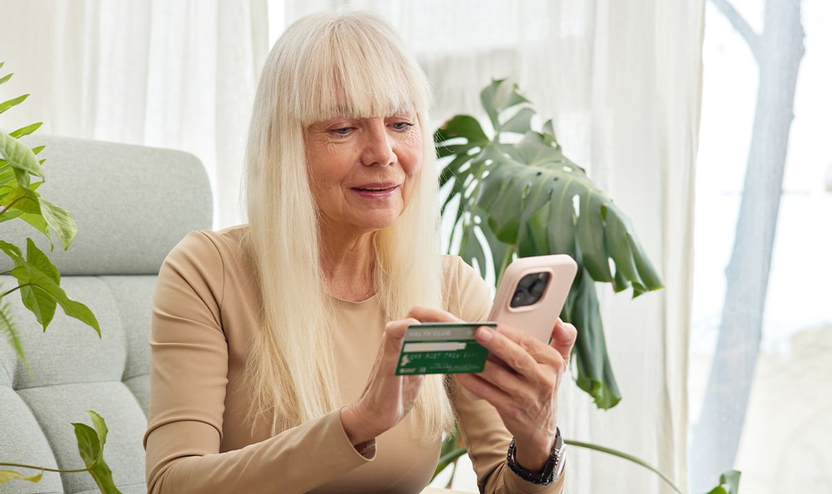 A woman checks her finances