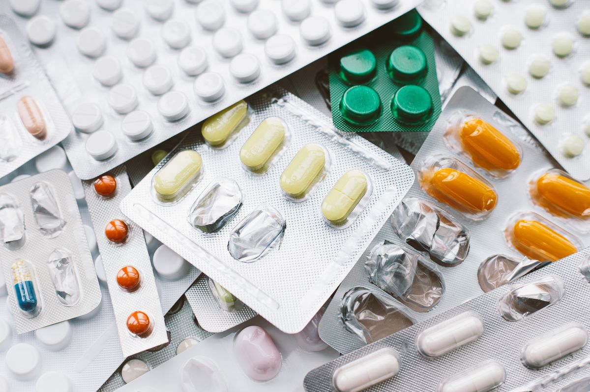 Drug prescription for treatment medication. Pharmaceutical medicament. Pharmacy theme, capsule pills with medicine antibiotic in packages.