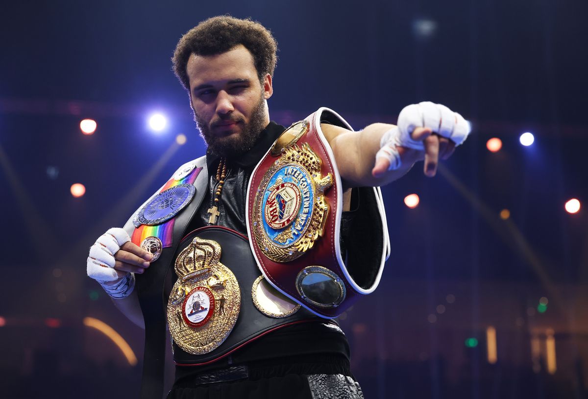 Moses Itauma celebrates victory with his belts following the WBO Inter-Continental, WBA International and Commonwealth Silver Heavyweight titles' fight between Moses Itauma and Demsey McKean as part of Oleksandr Usyk v Tyson Fury 2, Reignited card at Kingdom Arena on December 21, 2024 in Riyadh, Saudi Arabia.