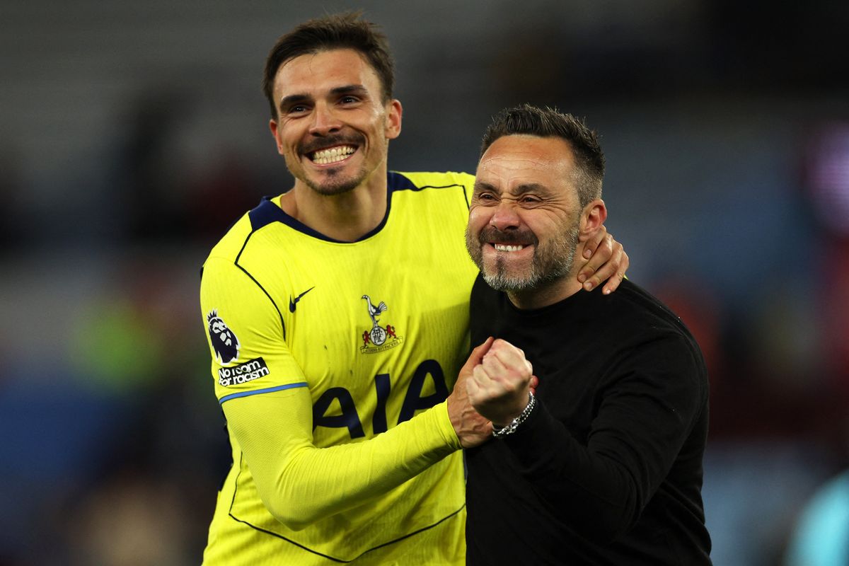 Joao Palhinha and Roberto De Zerbi enjoy the celebrations after the Premier League match between Aston Villa and Tottenham Hotspur at Villa Park