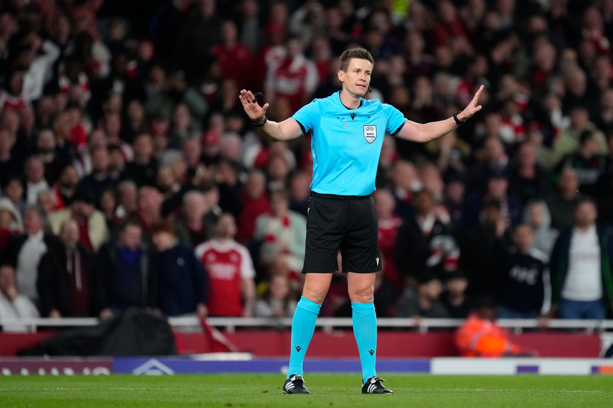 The referee Daniel Siebert gestures during the UEFA Champions League 2025/26 Semi Final Second Leg match between Arsenal FC and Atletico de Madrid at Arsenal Stadium