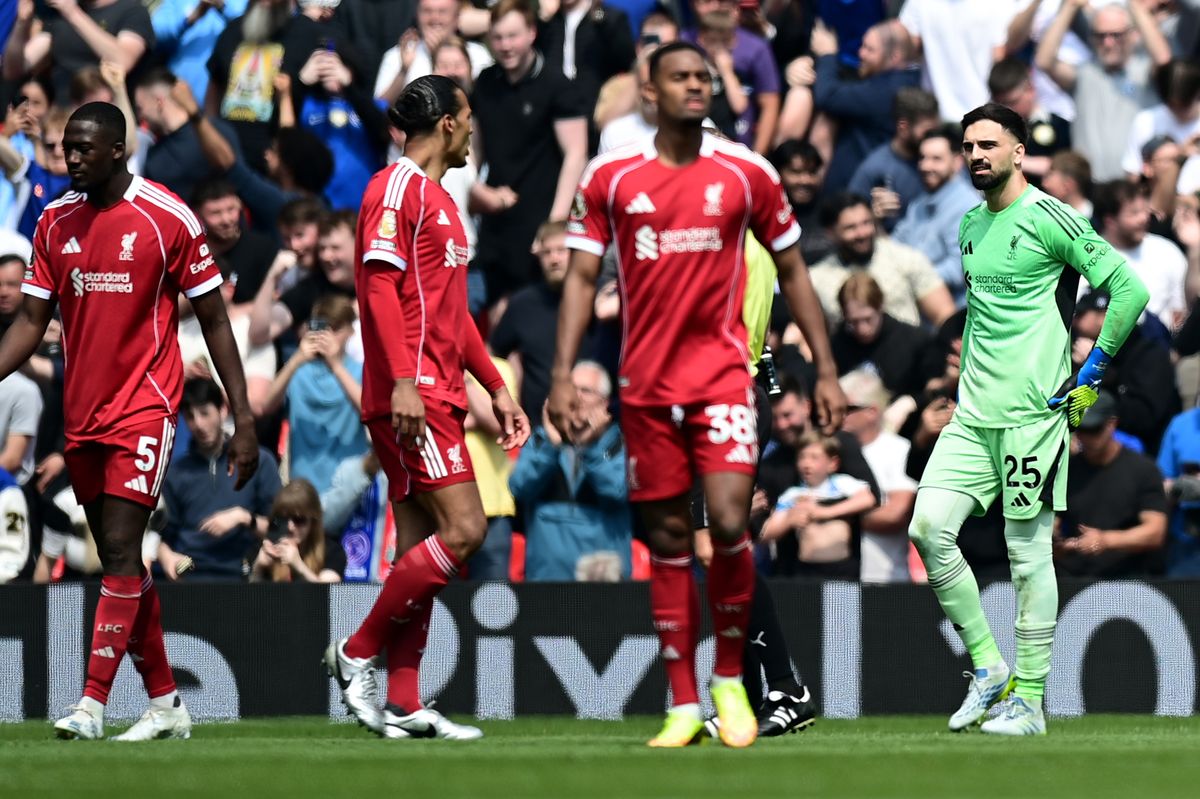 Liverpool's players look glum after Chelsea score a poor goal during the Premier League match at Anfield on May 9 2026