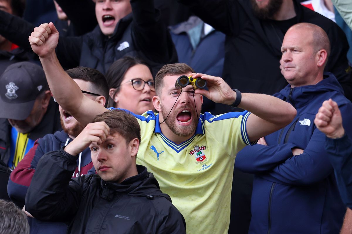MIDDLESBROUGH, ENGLAND - MAY 09: A fan of Southampton fan uses binoculars during the Sky Bet Championship Play Off Semi Final Second Leg match between Middlesbrough and Southampton at Riverside Stadium on May 09, 2026 in Middlesbrough, England. (Photo by Ed Sykes/Getty Images)